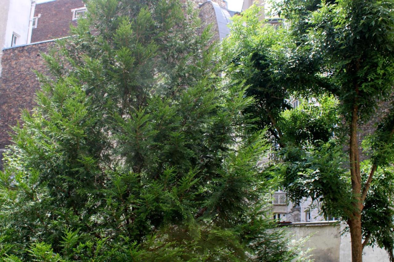 Appartamento A Cosy Gem 2 Steps From The Sacre-Coeur Parigi Esterno foto